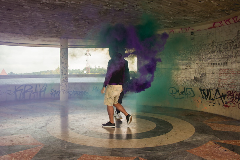 indoors, human arm, graffiti, adult, dancing, color, casual clothing, smoke, view, 4K, lifestyles, smoke grenade, full length, grenade, day, built structure