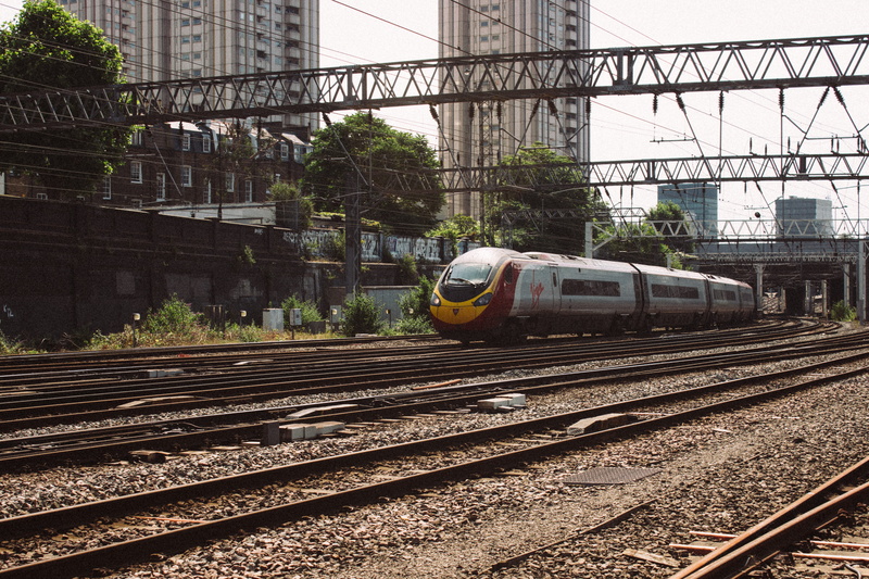 rail transportation, travel, train - vehicle, sun, train, mode of transportation, london, nature, built structure, commute, kings cross, city, public transportation