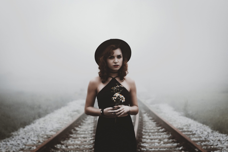 hands, black, one person, girl, looking, looking at camera, standing, front view, daytime, love, nature, lifestyles, fashion, females, holding, railroad