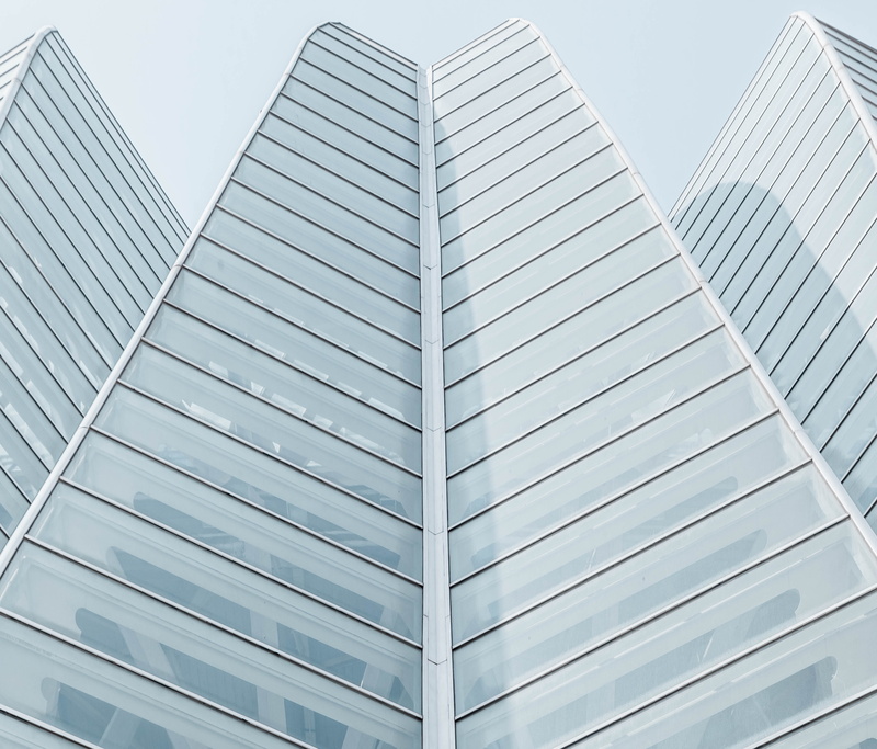 city, office, clean, architecture, glass - material, high, tall - high, outdoors, silver colored, minimalism, nature, clear sky, design, shape, arrow, building exterior