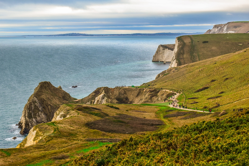 outdoors, scenics - nature, land, united kingdom, horizon over water, non-urban scene, grass, uk, tranquil scene, jurassic coast, coast, rock, horizon