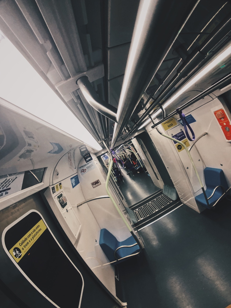 subway train, transportation system, built structure, rapid transit, modern, transportation, air vehicle, incidental people, train car, land vehicle, architecture