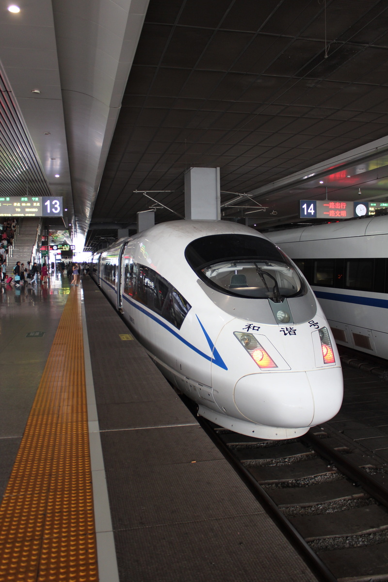 incidental people, speed, motor vehicle, mode of transportation, land vehicle, high, station, rail, public transportation, transport, luxury, railway, ceiling
