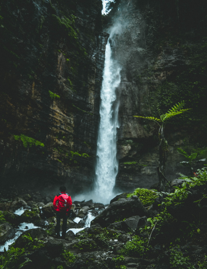 standing, motion, air terjun kapas biru, one person, blurred motion, long exposure, power in nature, flowing water, land, beauty in nature, solid, 4K