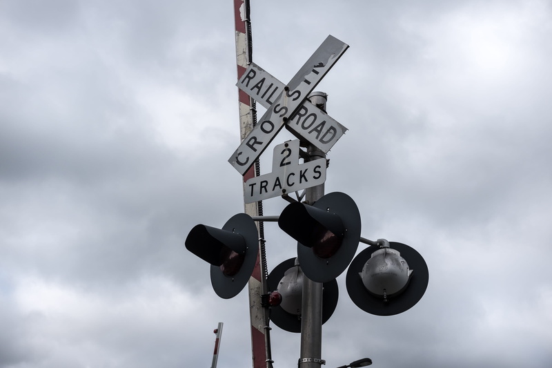 day, cloud - sky, danger, cross, pole, trains, rail, no people, railroads, old, crossing sign, sign, low angle view, guidance, railroad, symbol, railroad crossing