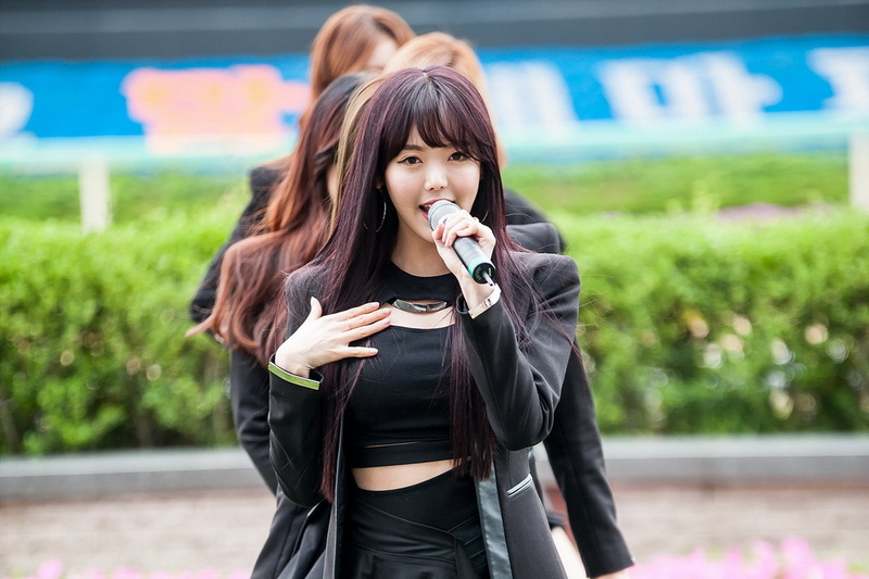 dal shabet, casual clothing, city, females, focus on foreground, hair, 1080P, one person, teenager, lifestyles, outdoors, child, clothing, young adult