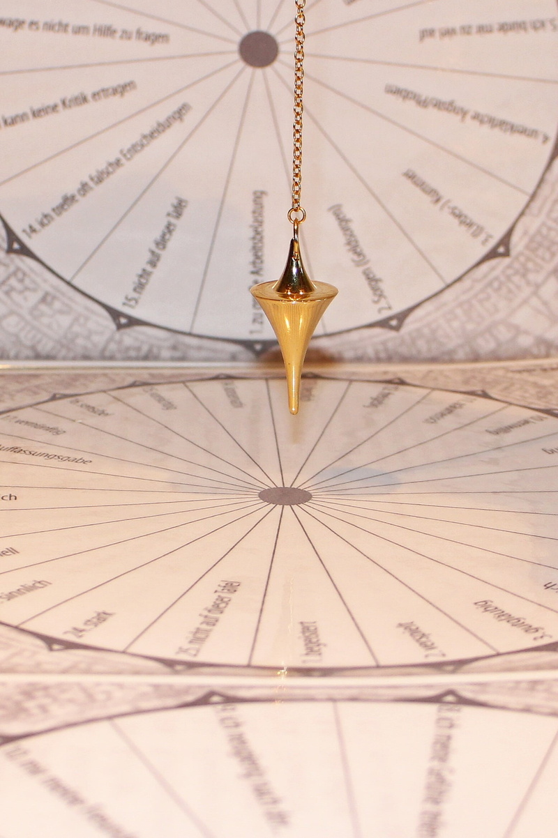 pendulum, selective focus, symbol, full frame, pendulum vibrations, conical, design, paper, still life, indoors, new age, education, spiritual, accuracy