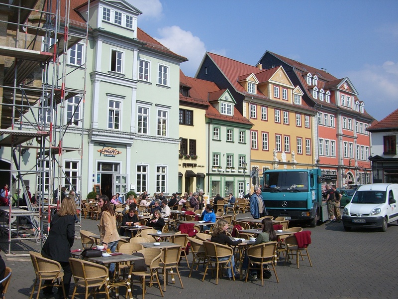 crowd, group of people, seat, real people, large group of people, table, building, sidewalk cafe, chair, city, 2K, marketplace, mode of transportation