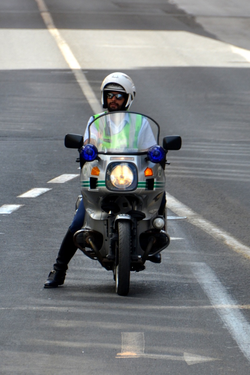 technology, city, road marking, outdoors, marking, two wheeled vehicle, security, road, policewoman, police, one person, blue light, transportation, helmet