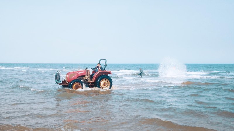 travel, water, person, sky, coast, clear sky, life, machine, beach, nature, beauty in nature, wave, amphibious vehicle, horizon over water, outdoors, atv