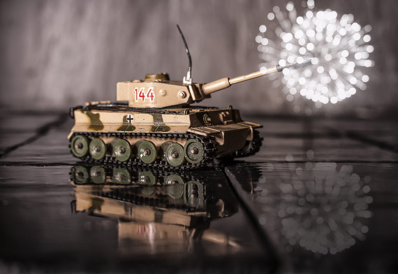 city, aggression, 2K, selective focus, machinery, town, studio shot, floor, urban, battle, indoors, road, explosive, weaponry, tank, illuminated, equipment