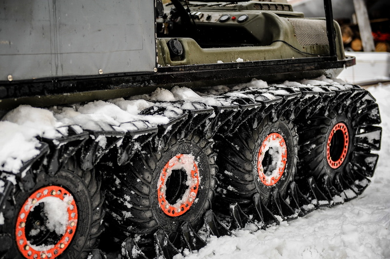 close-up, amphibious vehicle, 2K, transportation, nature, outdoors, motor vehicle, all terrain vehicle, wheel, vehicle part, cold temperature, black color