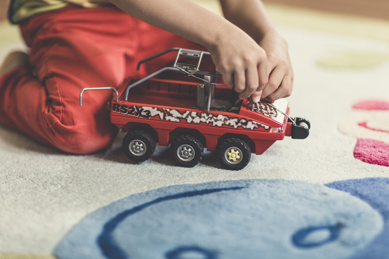 child, human body part, low section, amphibious vehicle, human hand, day, offspring, playmobil, wheel, toys, transportation, real people, close-up, toy