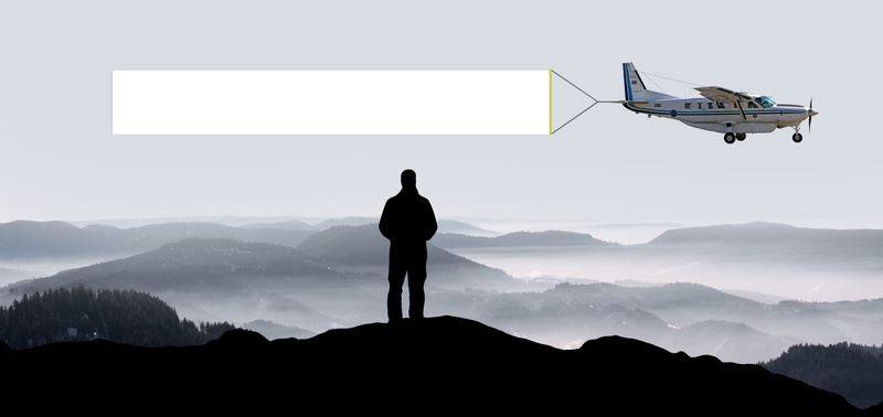 text box, label, adult, one person, loneliness, flyer, airplane, image overlay, above, mode of transportation, text input, landscape, aerospace industry