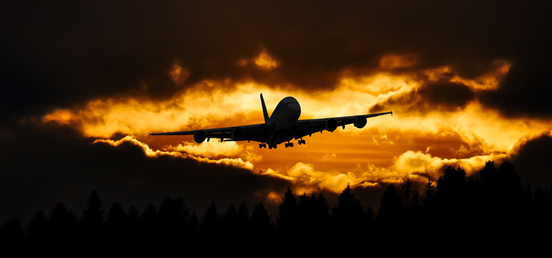 silhouette, nature, lighting, sunset, mode of transportation, commercial airplane, flyers, outdoors, landing, transportation, mood, dramatic sky, landing - touching down