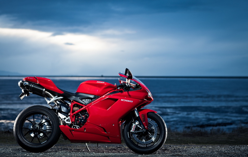mode of transportation, land Vehicle, sky, motorcycle, nature, one person, engine, summer, no People, sea, red, horizon, luxury, wheel, day, travel, crash helmet