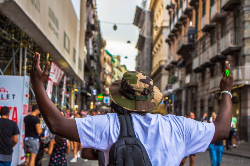 city life, body part, 5K, in the air, white, smile, bags, italy, human body part, built structure, adult, limb, naples, behaviour, man, building exterior