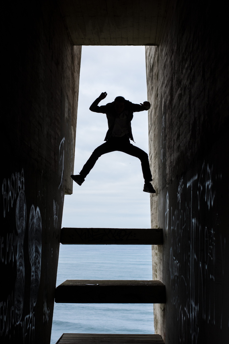 boy, silueta, jumping, water, composition, wall - building feature, rear view, day, built structure, mid-air, jump, portrait, sky, architecture, man, gijón
