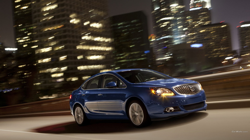 Buick Verano, blurred motion, night, built structure, traffic, blue cars, mode of transportation, on the move, skyscraper, building exterior, transportation