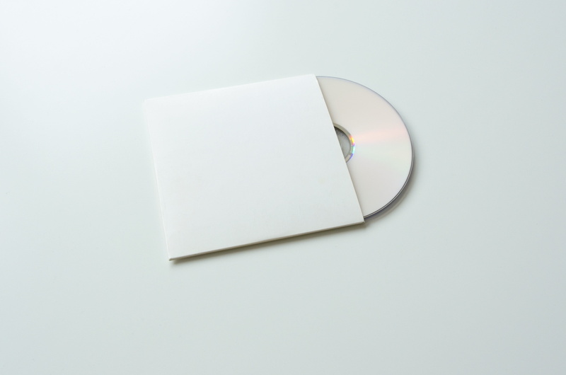 white, message, high angle view, disc, presentation, data, cut out, communication, indoors, cd-rom, letter, blank, copy space, design, modern, template