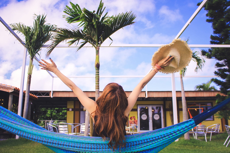 fun, lifestyles, cloud - sky, brown, long hair, adult, girls, human arm, outdoors, straw, caucasian Ethnicity, day, tropical Climate, sitting, females