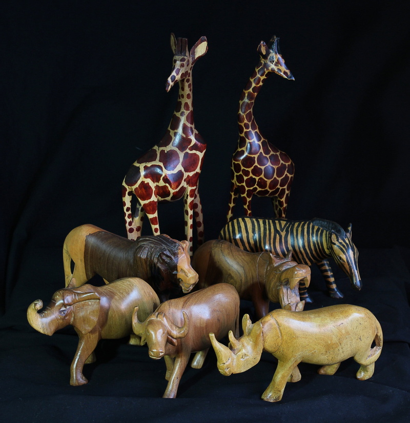 studio shot, sculpture, Africa, Souvenirs, group of animals, elephant, zebra, archaeology, lion, the past, Toys, mammal, craft, carved animals, still life
