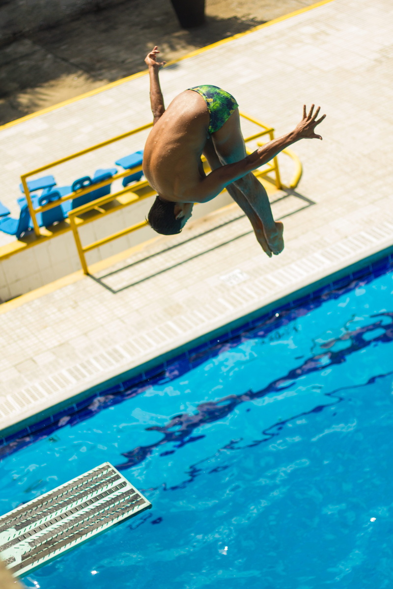 lifestyles, swimwear, water, swimming, leisure activity, diving, pool signs, diving into water, real people, full length, jumping, day, nature, outdoors