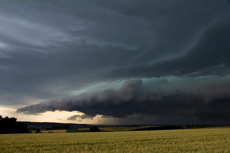nature, dark sky, clouds form, environment, scenics - nature, tranquil scene, cloud - sky, beauty in nature, storm, land, plant, field, clouds, rural scene