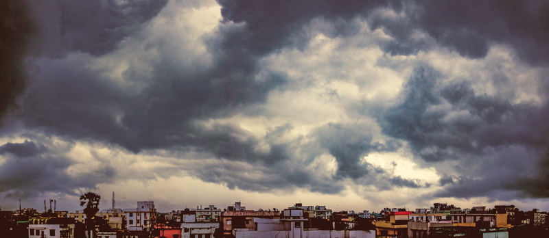 thunderstorm, cloudscape, horizon, shadow, light, building exterior, black, built structure, building, environment, danger, sky, season, dramatic, skyline