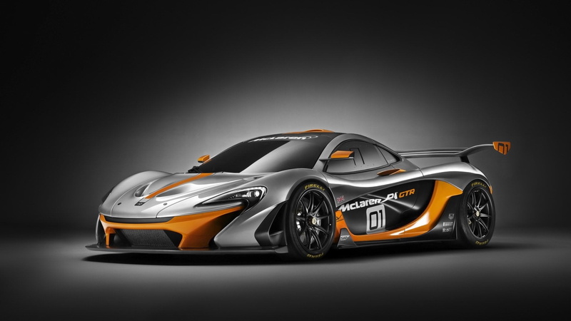 studio shot, chrome, transportation, motor vehicle, racecar, sports car, people, indoors, black background, gray, shiny, gray background, maclaren p1, three dimensional