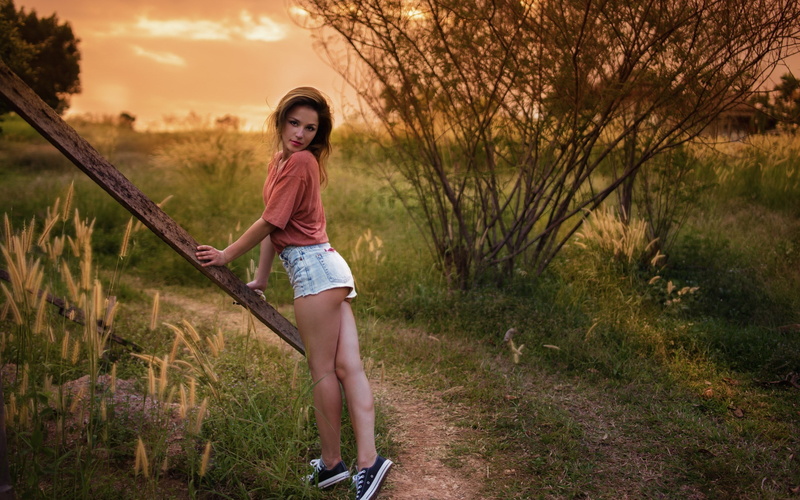 beautiful woman, s, brown, lifestyles, nature, leisure activity, outdoors, plant, women outdoors, casual clothing, women, shirt, front view, shorts, looking at camera