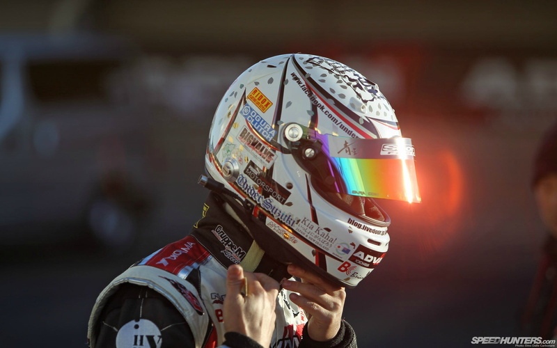 one person, obscured face, security, headshot, focus on foreground, helmet, racing, profile view, adult, robot, outdoors, technology, arts culture and entertainment
