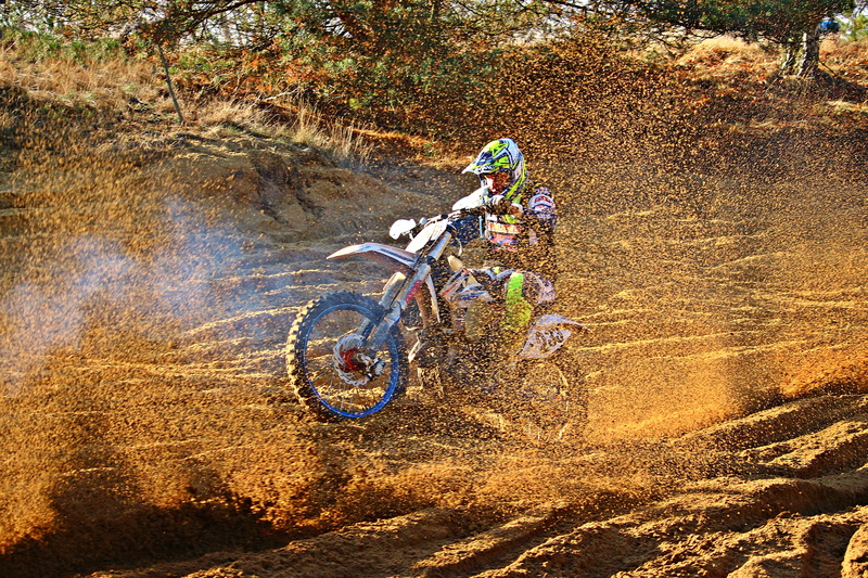 ride, headwear, motorcycle sport, skill, sport, competition, cross, terrain, sports clothing, real people, motion, outdoors, day, extreme sports, motocross