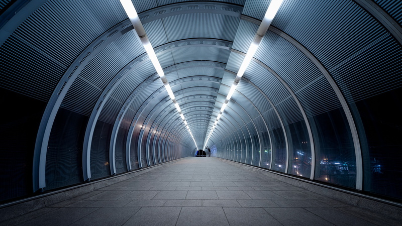 indoors, direction, modern, transportation, fixed link, underpass, architecture, structure, poplar, symmetry, walking, tunnel, line, built structure, poplar dlr station