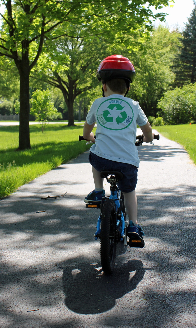 bike, childhood, shadow, bicycle, casual clothing, one person, riding, transportation, road, pedal power, sunlight, real people, ride, three years old