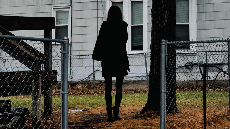 outdoors, nature, warm clothing, architecture, rear view, album covers, real people, Dark Bird Is Home, building exterior, lifestyles, barrier, walking