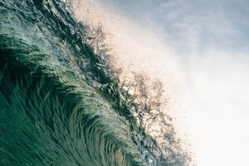 tranquil scene, grey, growth, textured, outdoors, low angle view, ocean, shore, rolling wave, day, beauty in nature, water, sunlight, environment, tsunami