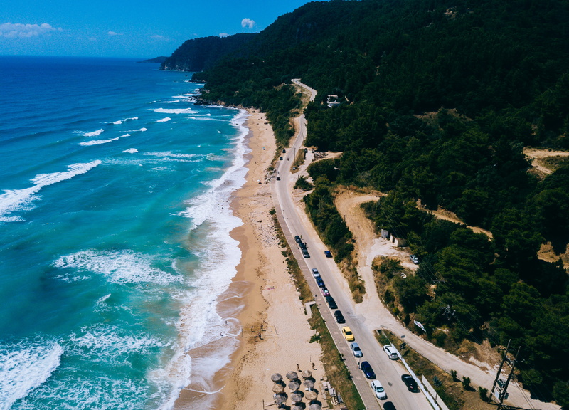 aerial, day, ocean, shore, unnamed road, tree, outdoors, 4K, sand, beauty in nature, coastline, preveza, no people, water, photo, motion, high angle view