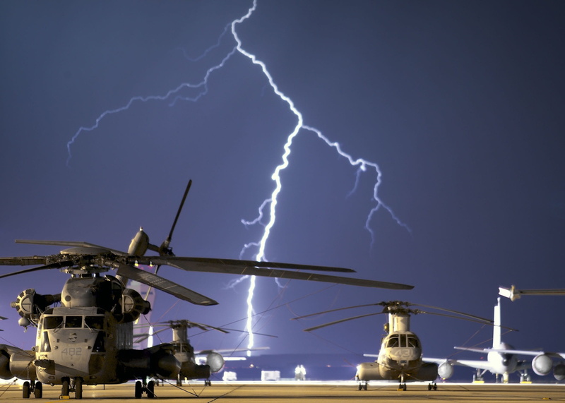 architecture, bright, thunderstorm, light, cloud - sky, building exterior, warning sign, illuminated, electricity, near, planes, daytime, stormy, airplanes