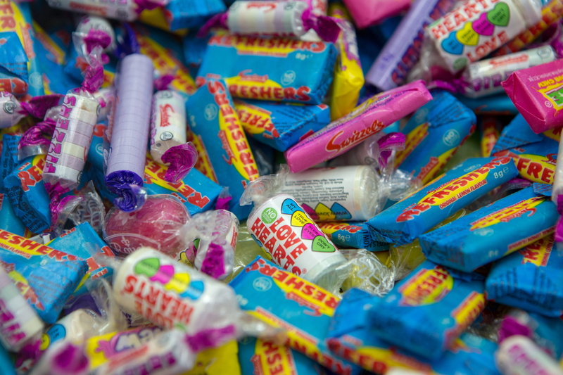 full frame, for sale, plastic, large group of objects, labeled, flavour, 5K, backgrounds, sweet, no people, celebration, selective focus, still life, food and drink