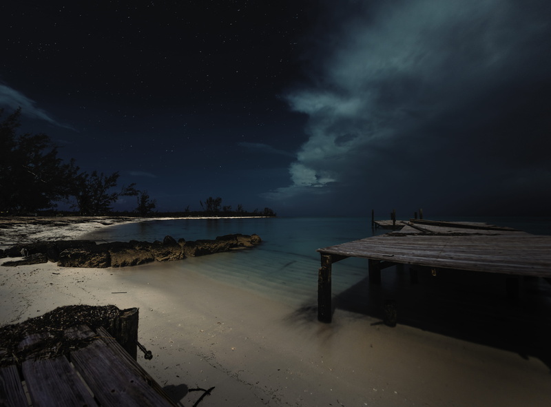 tranquility, dark, sand, tree, Midnight in a perfect world, near, time, wood - material, dock, power in nature, ocean, rock, non-urban scene, thunderstorm
