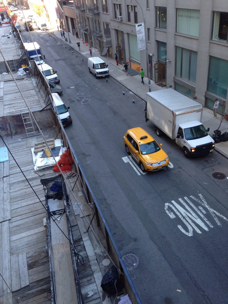 new York City, urban, incidental people, building exterior, land vehicle, City, Car, yellow taxi, car, high angle view, architecture, road marking, traffic Jam
