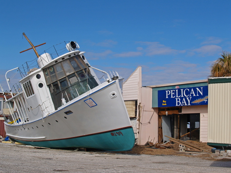 sea, built structure, beach, water, demolished, western script, tornado, beside, text, no parking, day, devastation, mode of transportation, boat, gabriel raggio
