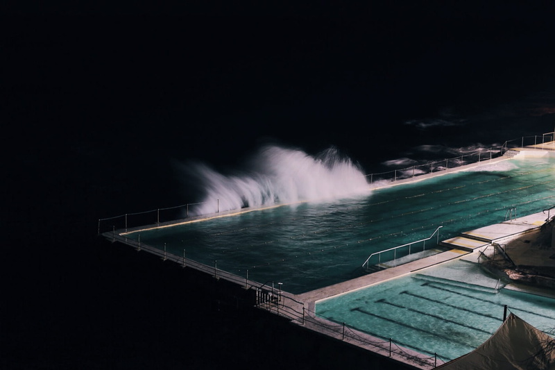 resort, storm, nautical vessel, seawall, night, copy space, time, dark, olympic, nature, power in nature, illuminated, splash, swimming, power, pool, rectangular