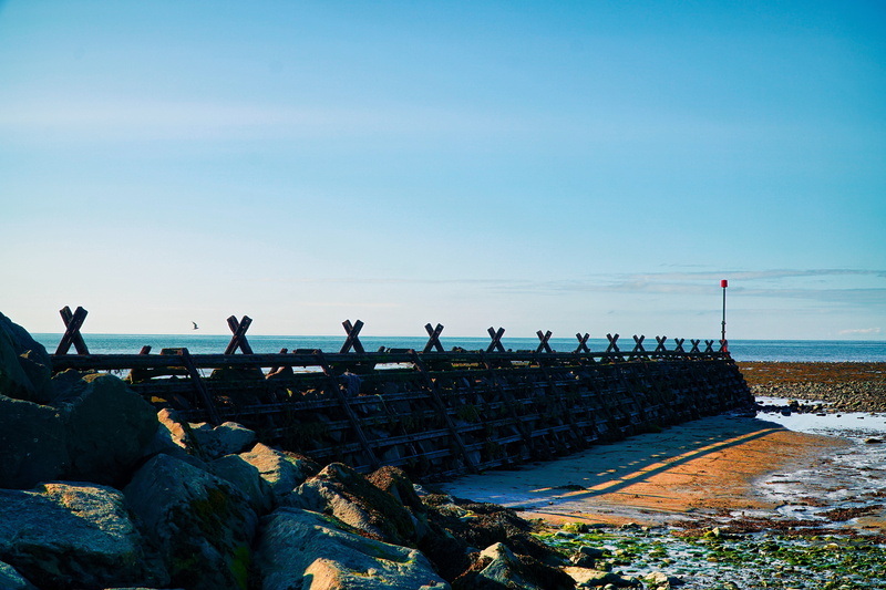 shore, defense, sun, horizon, solid, sea, coast, tranquility, outdoor, clear sky, groyne, beach, seaside, summer, rock, scenic, sky, ocean, 5K, land, copy space