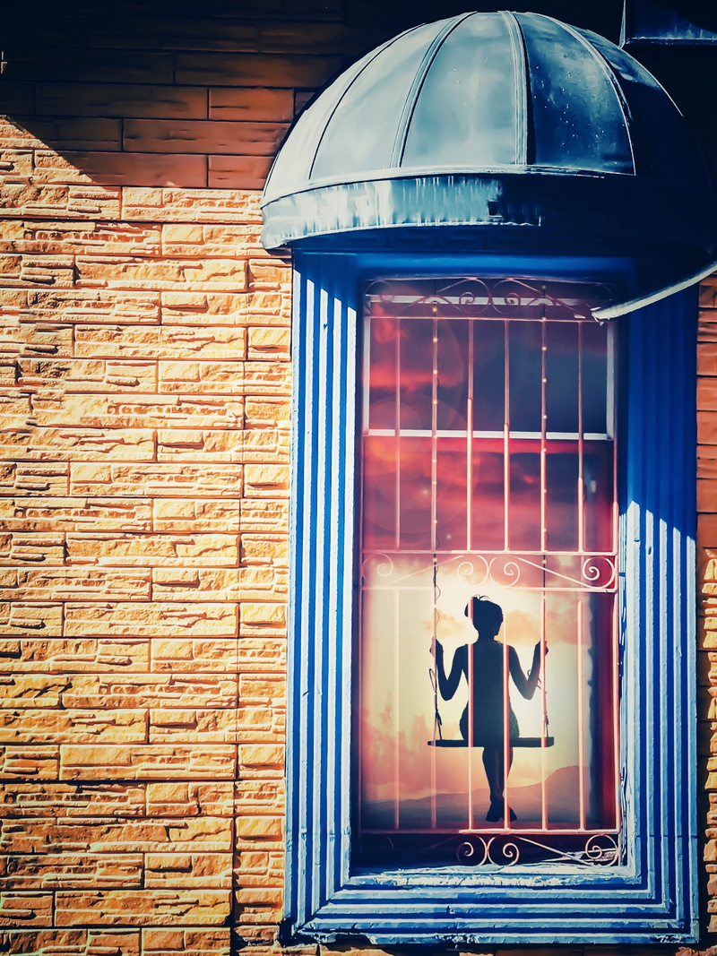 girl, red, window, transparent, communication, sadness, imprisoned, glass - material, seesaw, day, loneliness, building, brick, built structure, brick wall