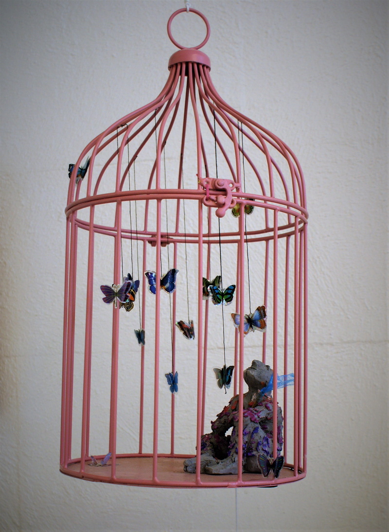 wall - building feature, sound, cage, art, table, art and craft, indoors, arrangement, imprisoned, birdcage, decoration, plastic, sculpture, close-up, hanging