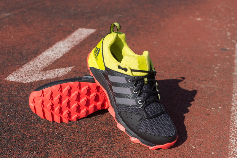 adidas, sports equipment, clothing, running, sole of shoe, track, sport, day, high angle view, yellow, boots, 5K, spikes, galaxy trail, no people, track and field