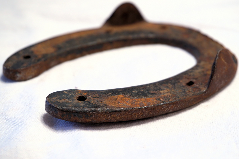 no people, white background, 4K, lucky charm, ride, rusty, close-up, metal, horseshoe, single object, antique, cut out, ruined, studio shot, deco, man made object