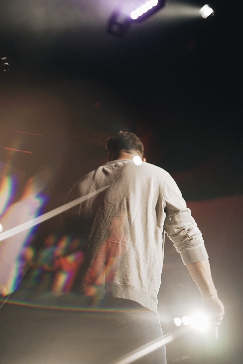 clothing, grey, occupation, night life, 4K, flare, stage, indoors, three quarter length, apparel, people, lighting, one person, musical instrument, human
